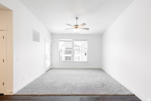 4655 South 720 West, Unit I303 Mapleton, UT 84664 - Photo 14 of 15 Spare room featuring a ceiling fan and dark wood-style flooring