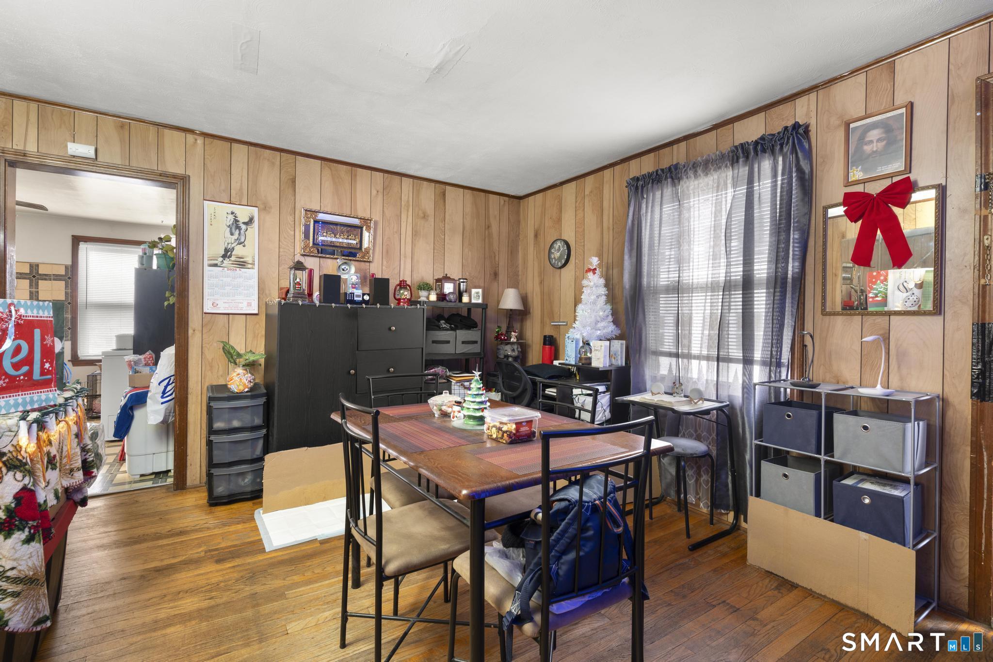 23 North First Street Meriden, CT 06451 - Photo 14 of 29 a view of a dining room with furniture window and wooden floor