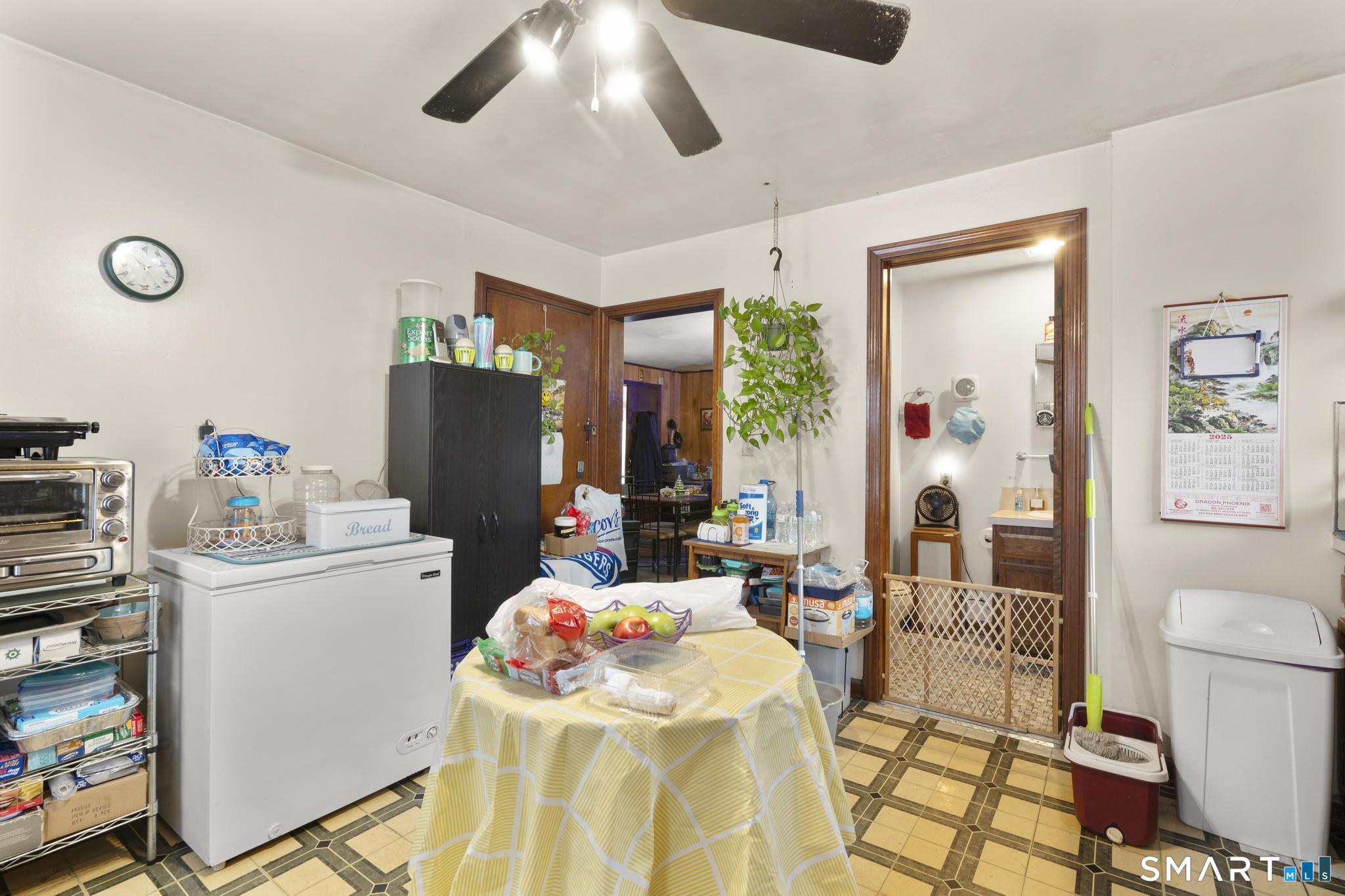 23 North First Street Meriden, CT 06451 - Photo 18 of 29 a very nice looking room with a dining table painted walls and white walls