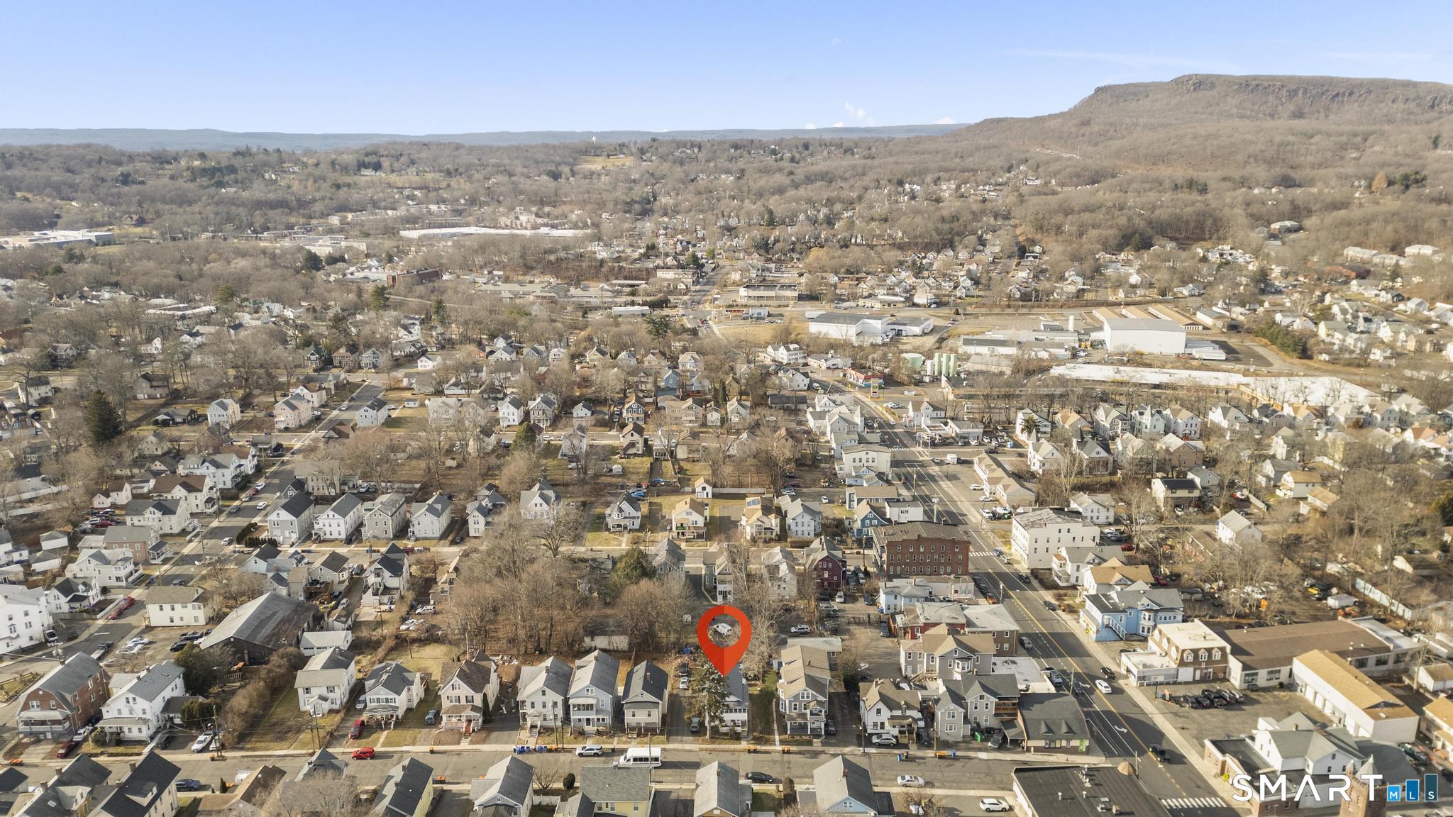 23 North First Street Meriden, CT 06451 - Photo 3 of 29 an aerial view of residential houses with outdoor space