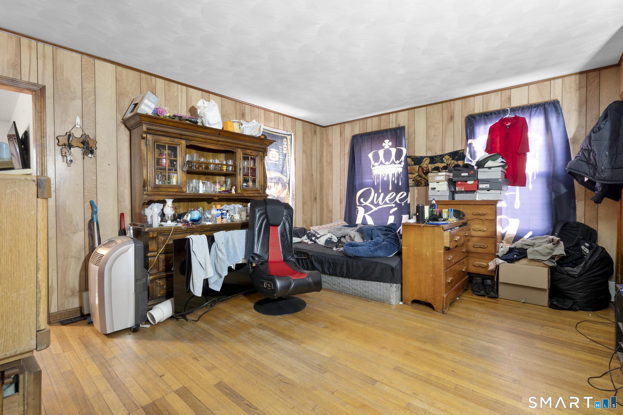 23 North First Street Meriden, CT 06451 - Photo 6 of 29 a view of a livingroom with workspace and a window