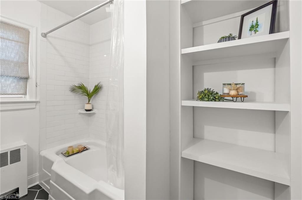 416 West Lexington Avenue High Point, NC 27262 - Photo 23 of 45 Love all the shelving in main level bath