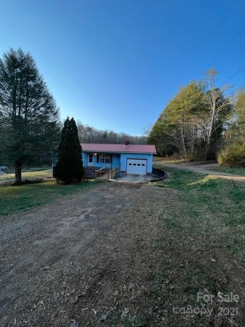 3229 Hiwassee Dam Access Road Murphy, NC 28906 - Photo 1 of 20 a view of a big house with a yard