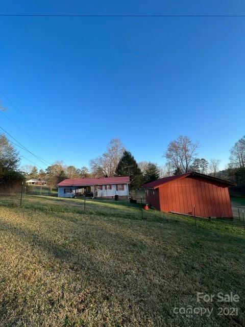 3229 Hiwassee Dam Access Road Murphy, NC 28906 - Photo 2 of 20 a view of a garden with large trees