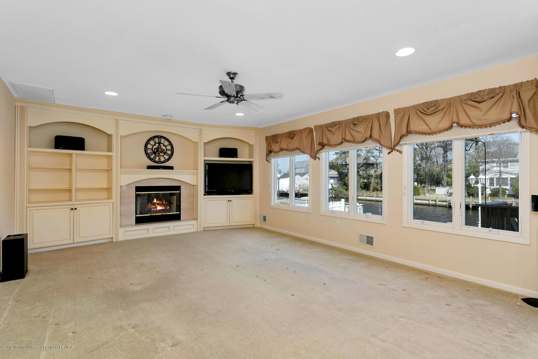 29 Channel Road Toms River, NJ 08753 - Photo 15 of 37 Wall of Windows/Fireplace/Built ins