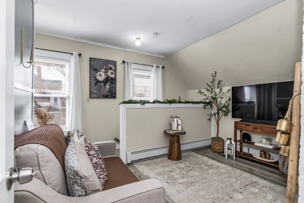 11 Cambridge Street Lawrence, MA 01843 - Photo 32 of 40 a living room with furniture and a flat screen tv