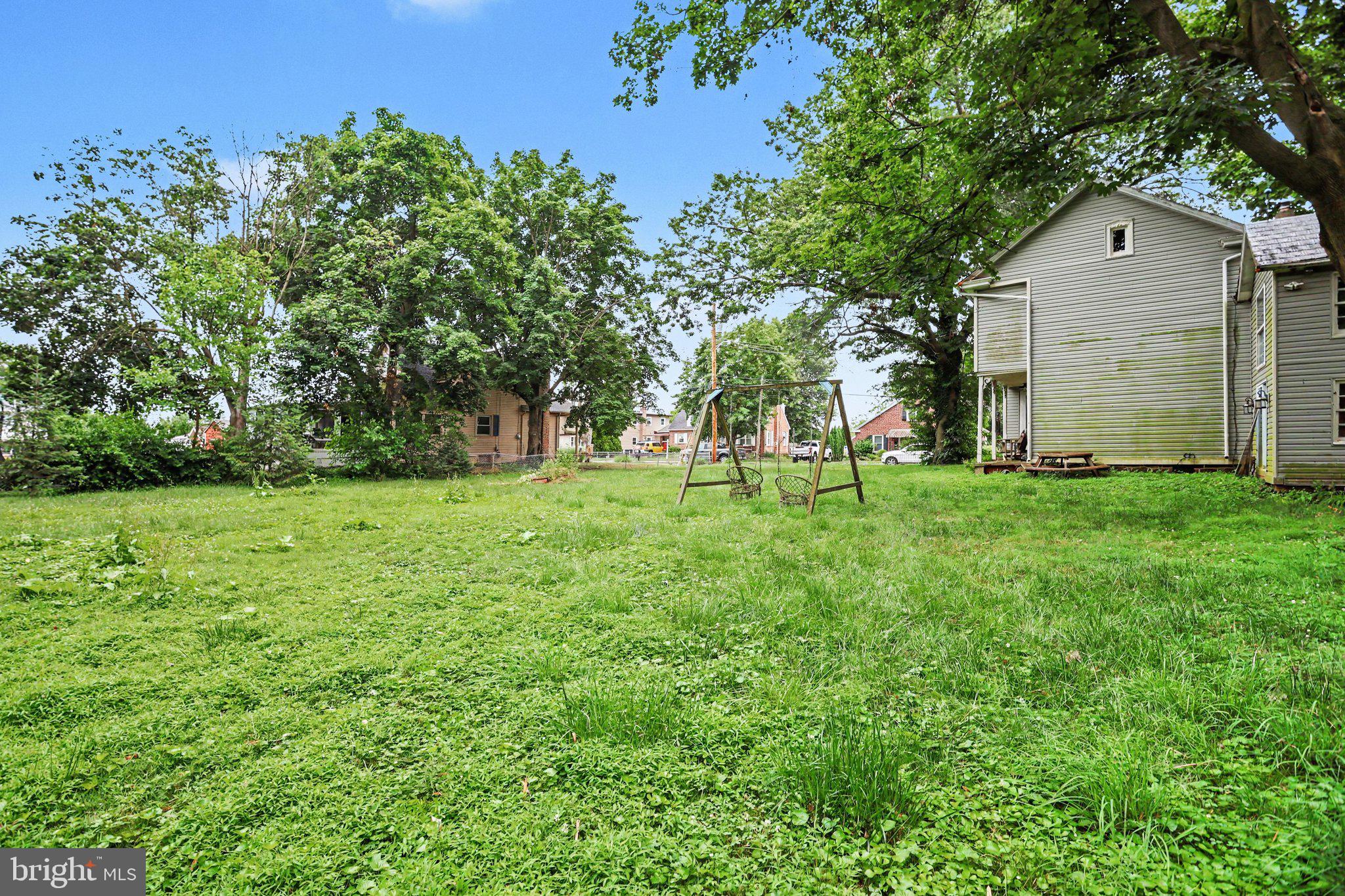 61 Mayfield Street Dover, PA 17315 - Photo 10 of 26 Spacious yard with lush greenery.