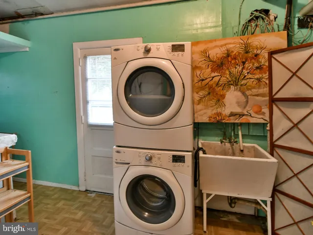 a utility room with dryer and washer