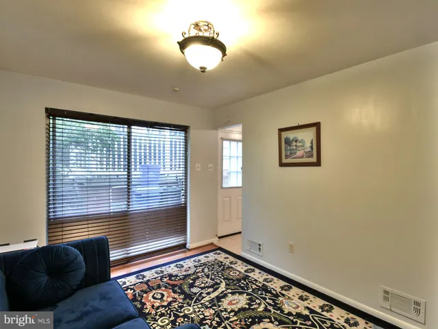 a view of a livingroom with wooden floor