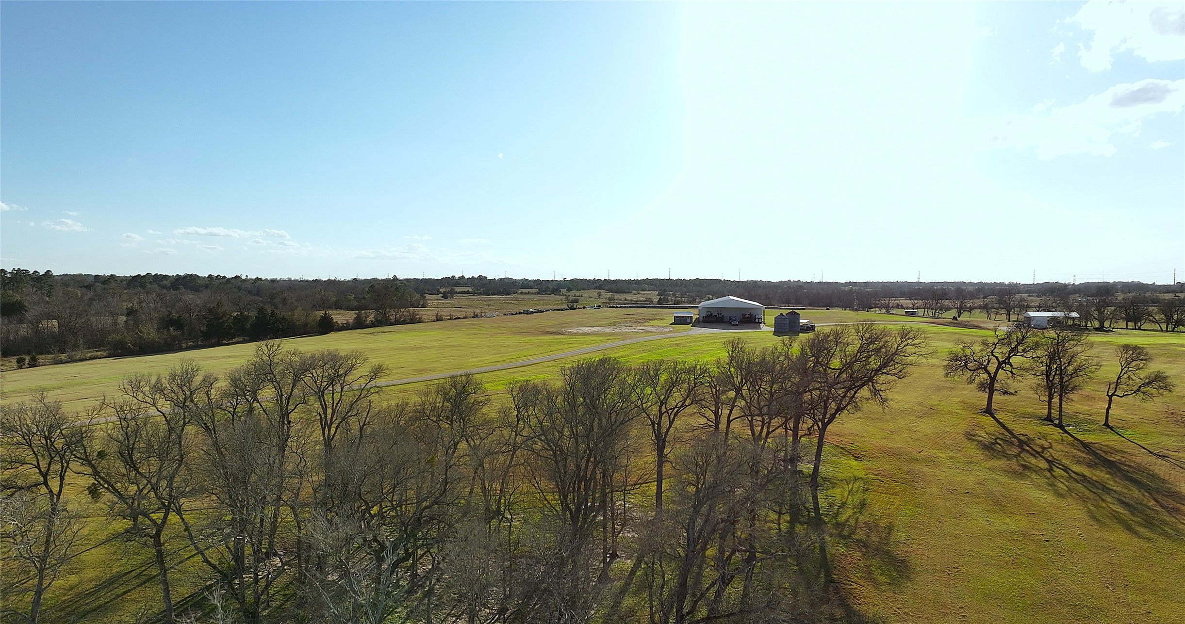 3283-2 Fm 2562 Road Anderson, TX 77830 - Photo 34 of 50 a view of a lake with houses in the back