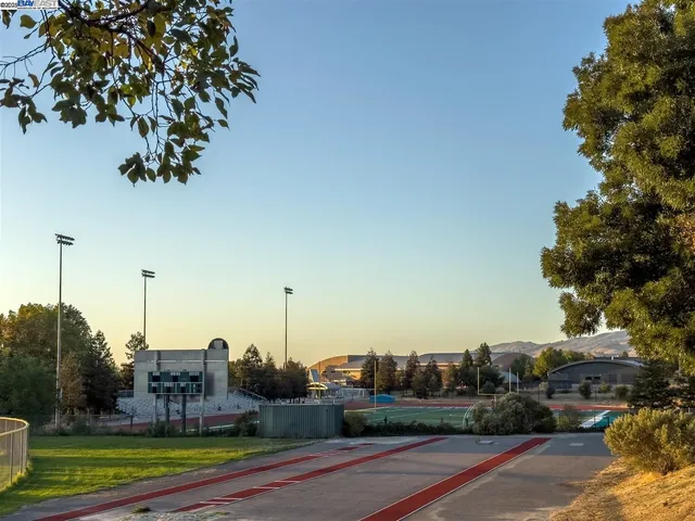 a view of lake with green space