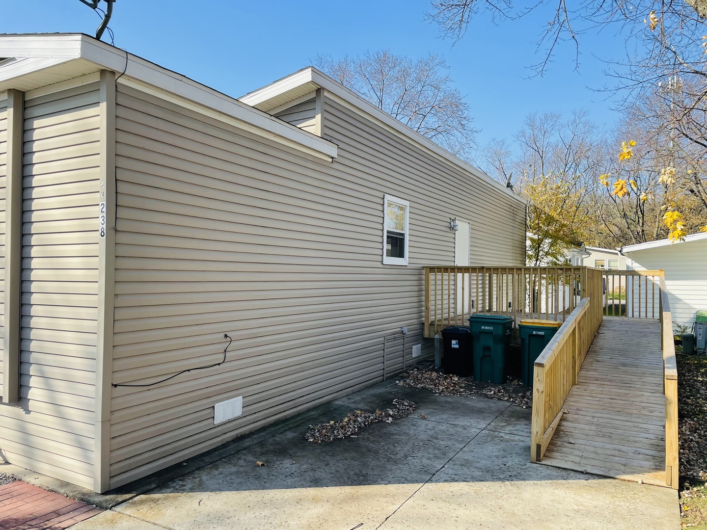 238 Northshore Road Elgin, IL 60123 - Photo 15 of 16 a view of a house with wooden deck