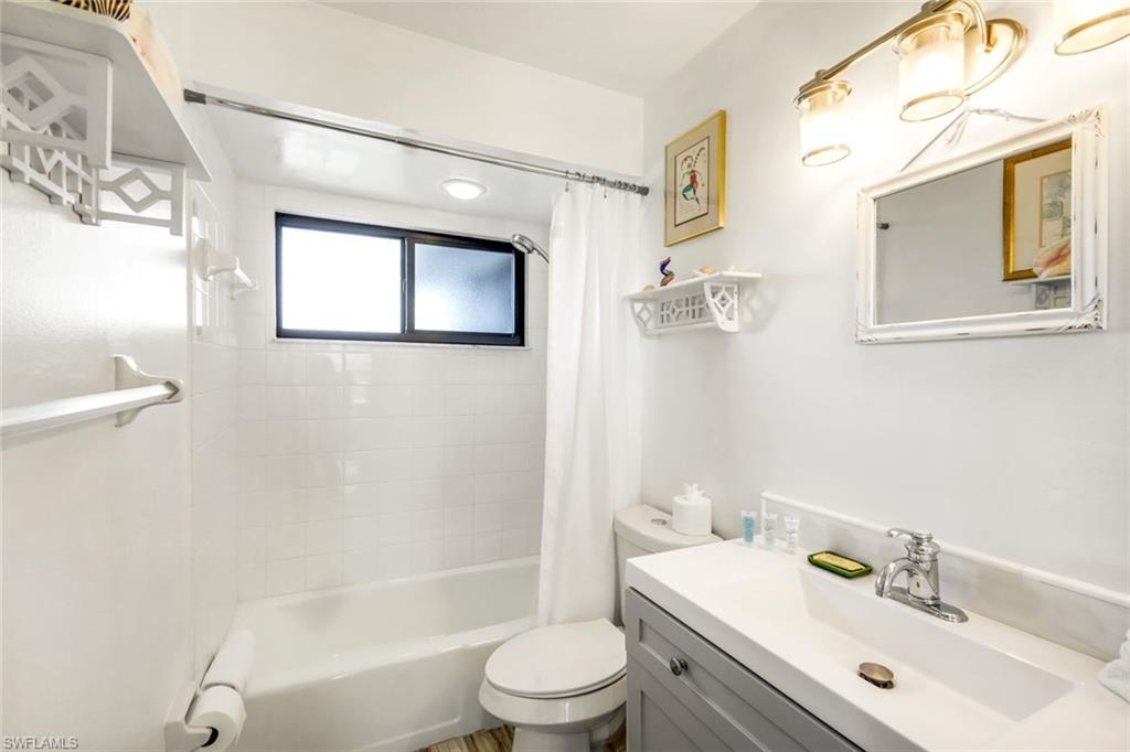 647 Rabbit Road Sanibel, FL 33957 - Photo 24 of 46 a bathroom with a sink a toilet and shower