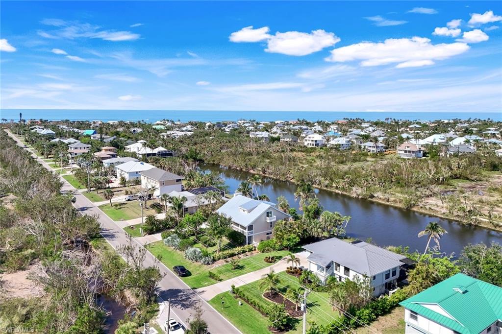 647 Rabbit Road Sanibel, FL 33957 - Photo 44 of 46 an aerial view of residential houses with outdoor space