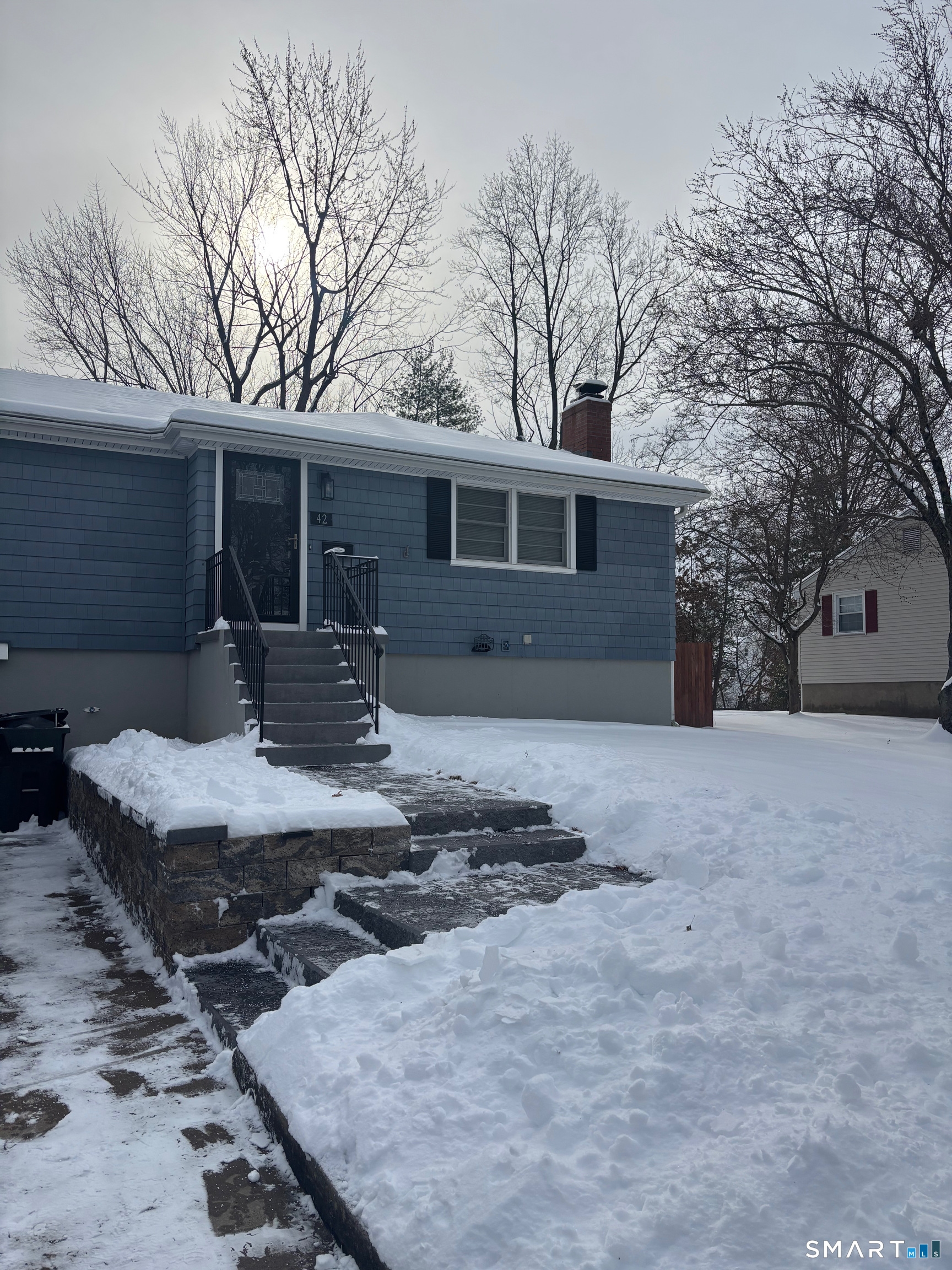 a front view of house with yard