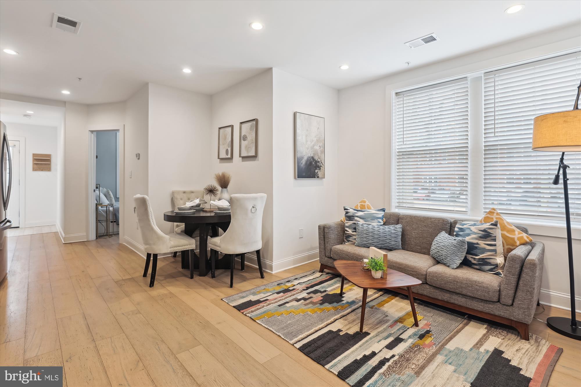 200 Hamilton Street Northwest, Unit 2 Washington, DC 20011 - Photo 11 of 16 a living room with furniture and wooden floor