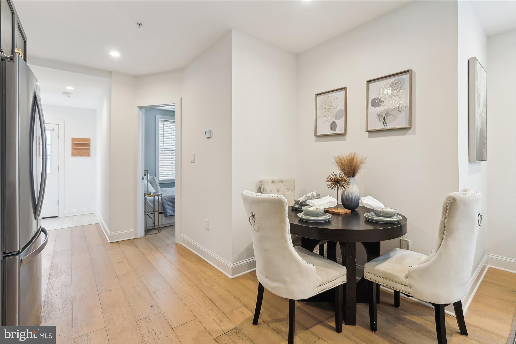 200 Hamilton Street Northwest, Unit 2 Washington, DC 20011 - Photo 6 of 16 a view of a room with furniture and wooden floor