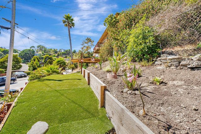 a view of balcony with furniture