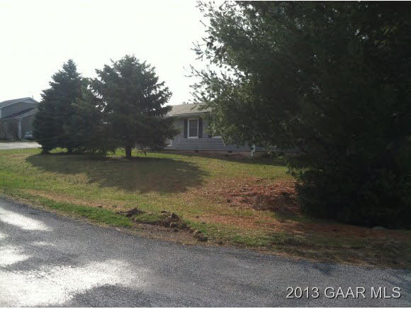 89 Buckboard Road Waynesboro, VA 22980 - Photo 5 of 13 a view of a yard with a fountain