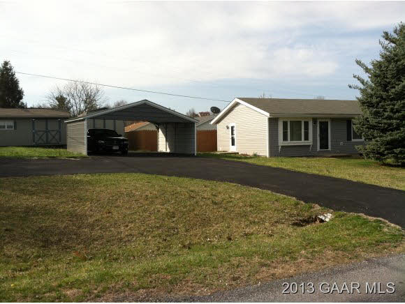 89 Buckboard Road Waynesboro, VA 22980 - Photo 6 of 13 a front view of a house with garden