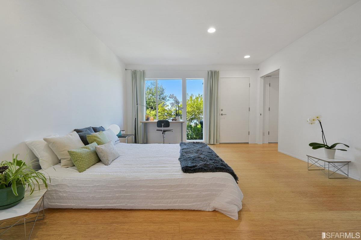 256 Columbia Avenue Kensington, CA 94708 - Photo 16 of 37 a bedroom with a bed and window