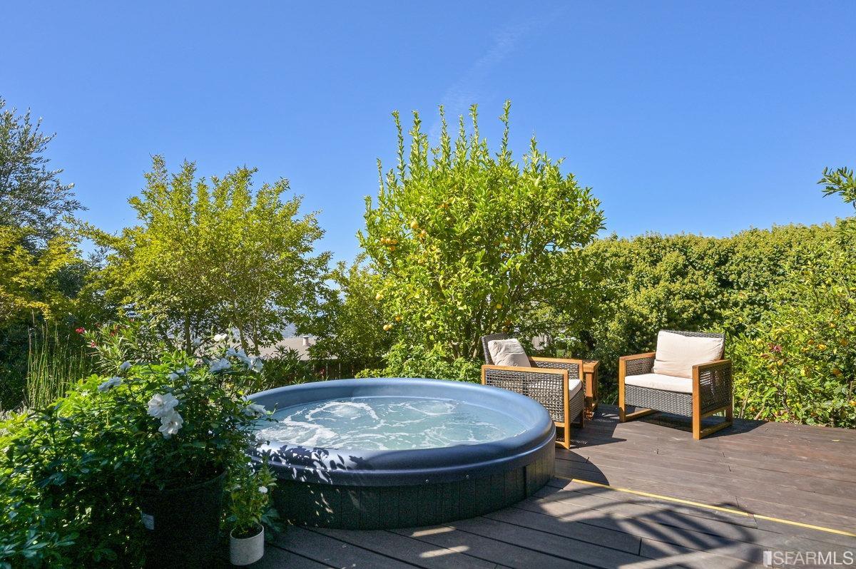 256 Columbia Avenue Kensington, CA 94708 - Photo 18 of 37 a view of a backyard with sitting area