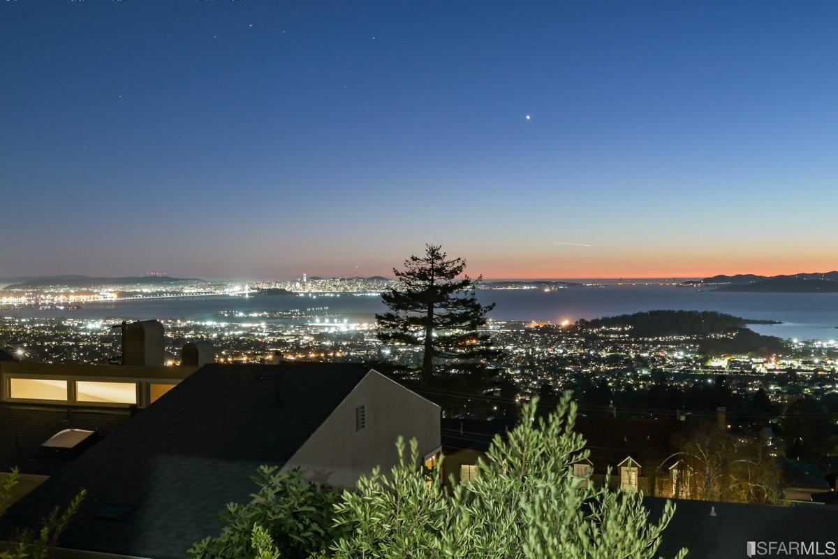 256 Columbia Avenue Kensington, CA 94708 - Photo 3 of 37 a view of a lake with a city