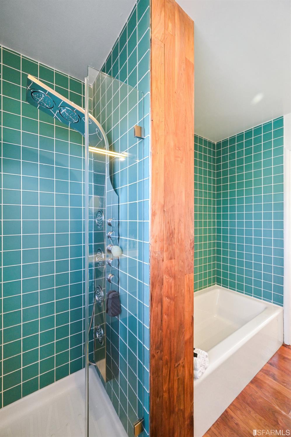 256 Columbia Avenue Kensington, CA 94708 - Photo 25 of 37 a bathroom with a bathtub and shower