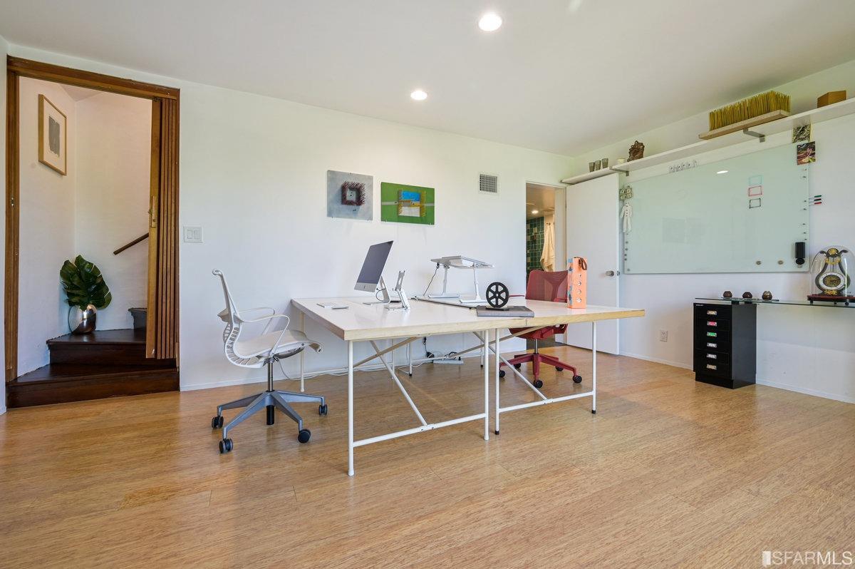 256 Columbia Avenue Kensington, CA 94708 - Photo 29 of 37 a workspace with furniture and wooden floor