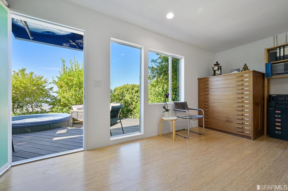 256 Columbia Avenue Kensington, CA 94708 - Photo 30 of 37 a living room with furniture and a window