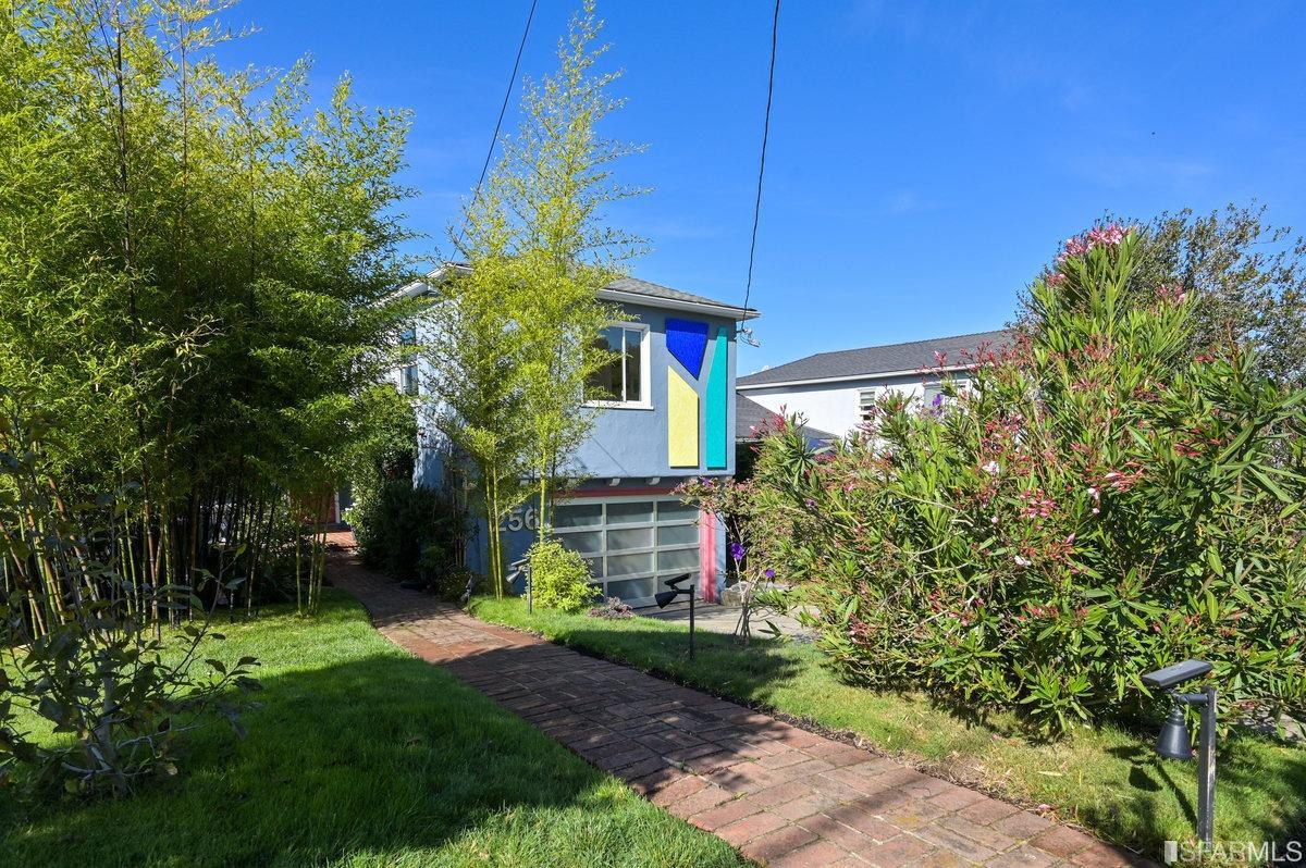 256 Columbia Avenue Kensington, CA 94708 - Photo 4 of 37 a front view of a house with a yard
