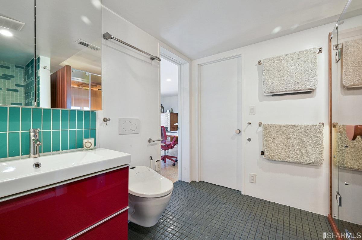 256 Columbia Avenue Kensington, CA 94708 - Photo 32 of 37 a bathroom with a sink toilet and shower