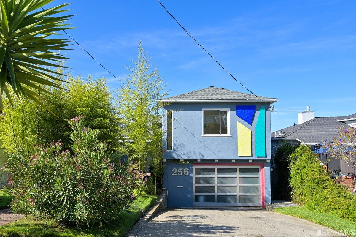 256 Columbia Avenue Kensington, CA 94708 - Photo 5 of 37 a front view of a house with a yard