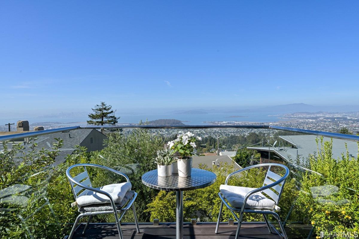 256 Columbia Avenue Kensington, CA 94708 - Photo 7 of 37 a view of a chairs and table in patio