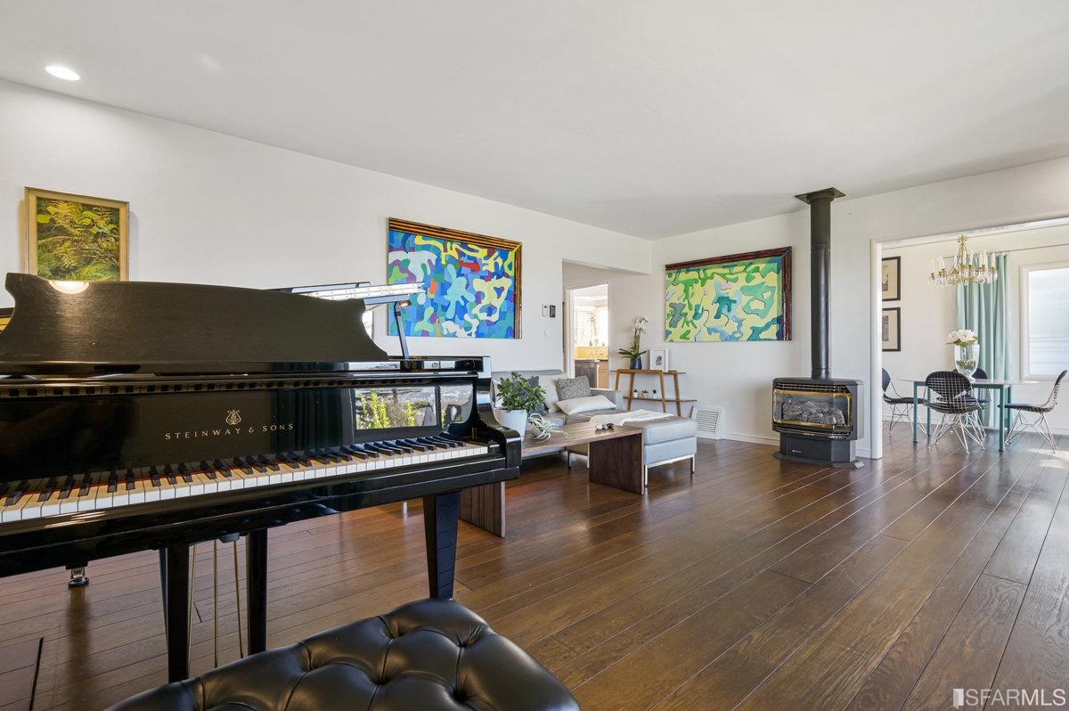 256 Columbia Avenue Kensington, CA 94708 - Photo 8 of 37 a living room with furniture pool table and a flat screen tv