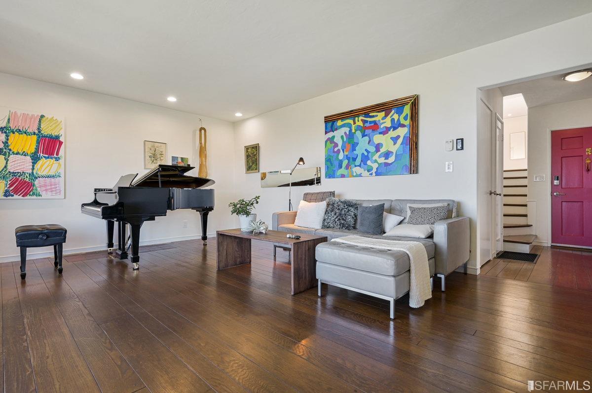 256 Columbia Avenue Kensington, CA 94708 - Photo 10 of 37 a living room with furniture and wooden floor