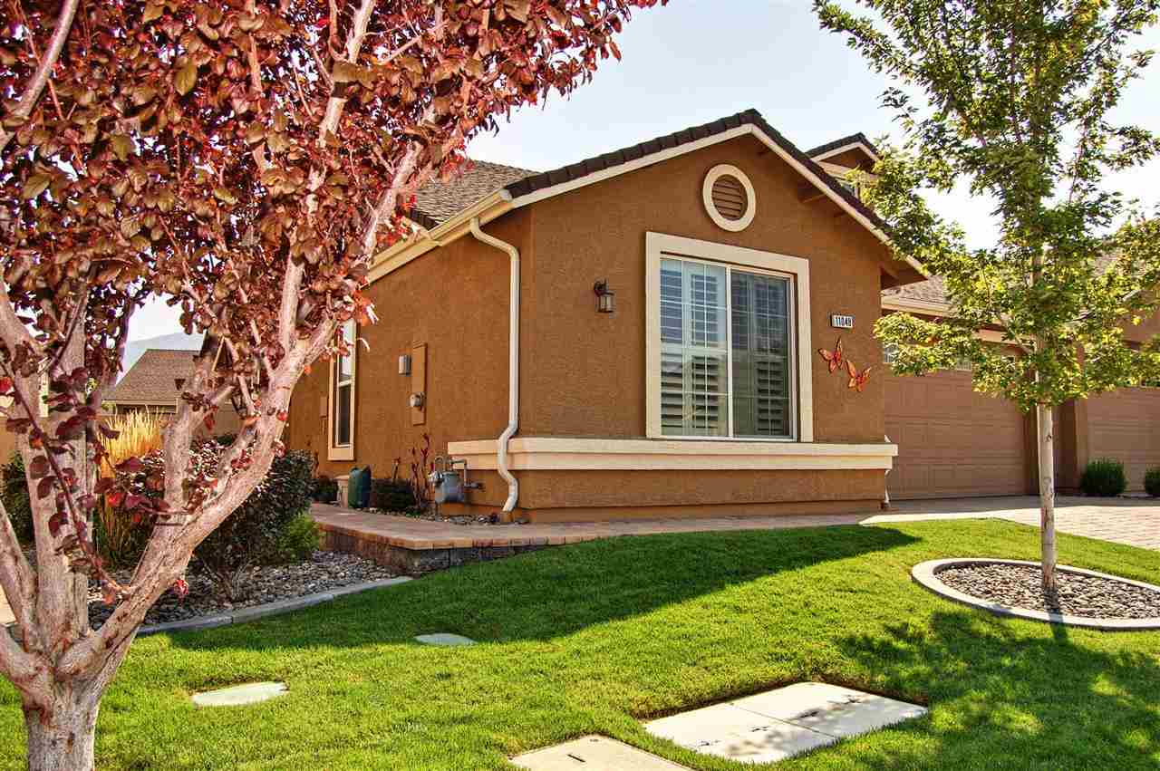 11048 Lamour Lane Reno, NV 89521 - Photo 1 of 1 a front view of a house with garden