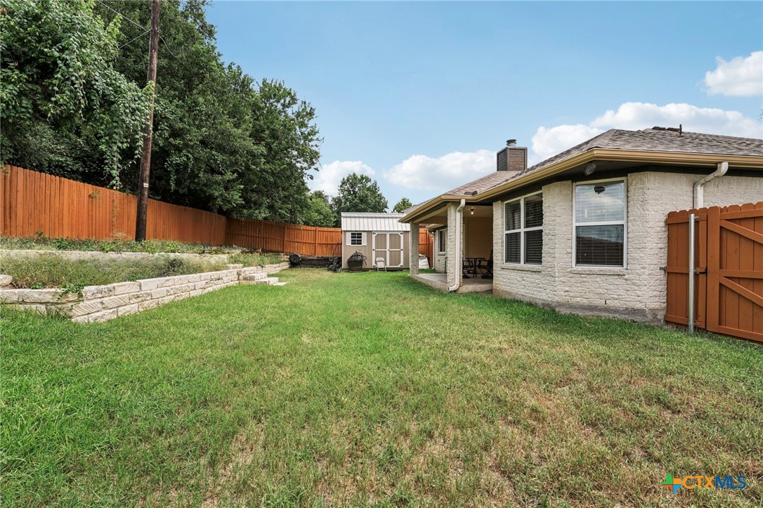 5420 Foxhill Road Temple, TX 76502 - Photo 37 of 47 a view of a house with a backyard