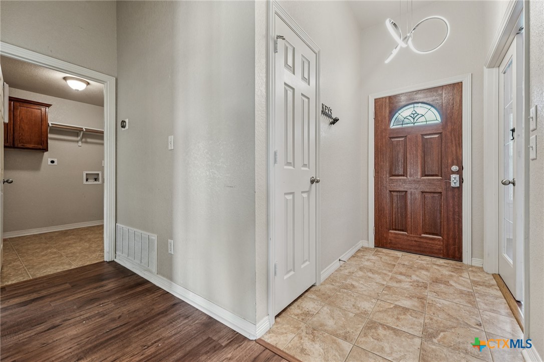 5420 Foxhill Road Temple, TX 76502 - Photo 7 of 47 a view of a hallway with wooden floor