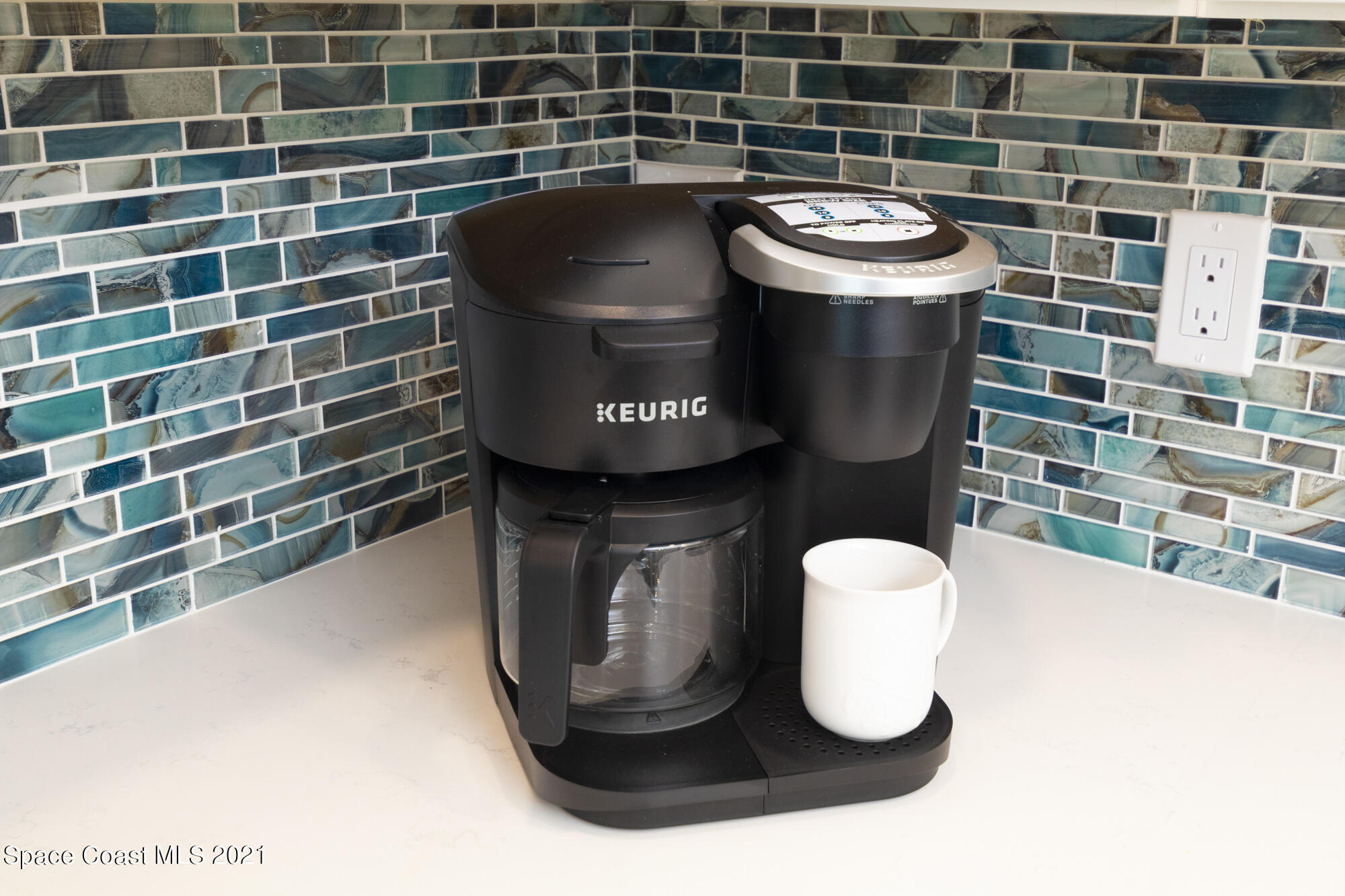 171 North Atlantic Avenue, Unit 39 Cocoa Beach, FL 32931 - Photo 11 of 29 a bathroom with a toilet and a sink