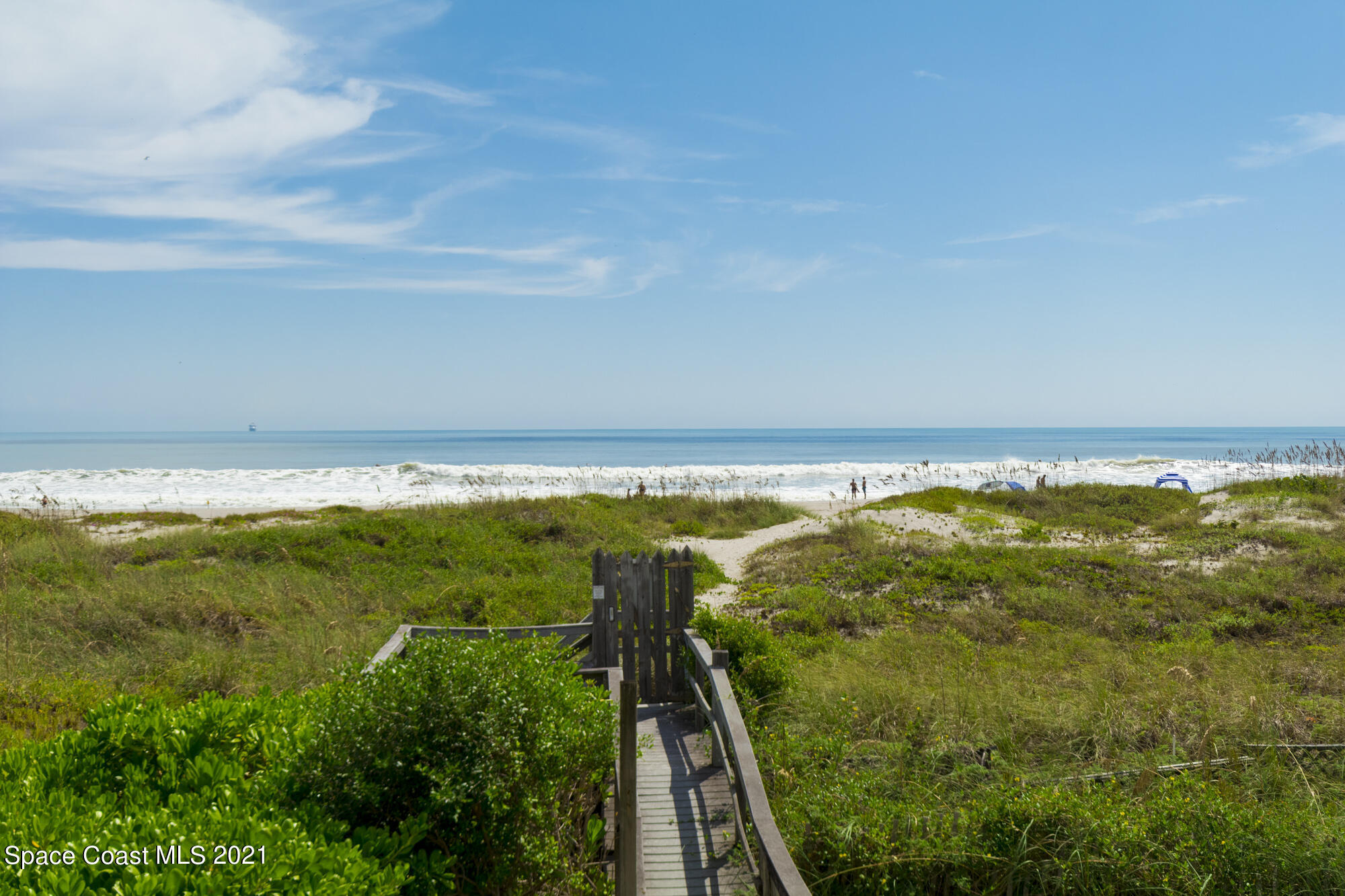 171 North Atlantic Avenue, Unit 39 Cocoa Beach, FL 32931 - Photo 18 of 29 a view of an ocean and beach