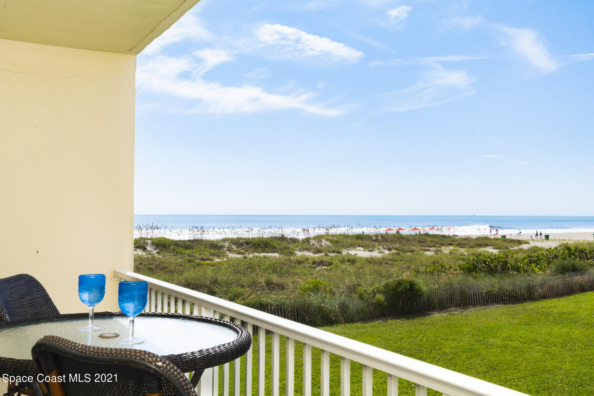 171 North Atlantic Avenue, Unit 39 Cocoa Beach, FL 32931 - Photo 21 of 29 a view of a lake from a balcony with furniture