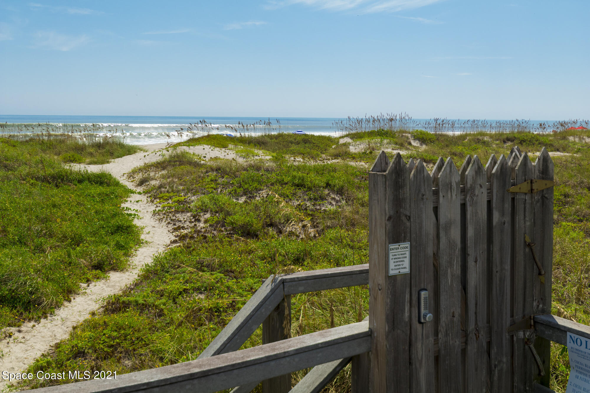 171 North Atlantic Avenue, Unit 39 Cocoa Beach, FL 32931 - Photo 27 of 29 a view of a balcony with an outdoor space