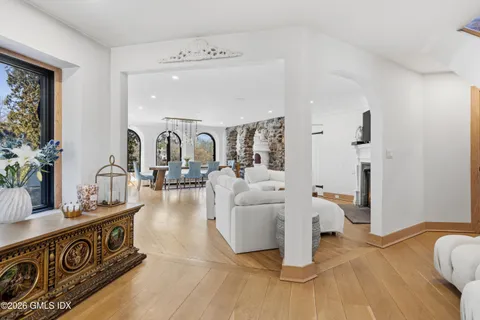 a living room with furniture and a table