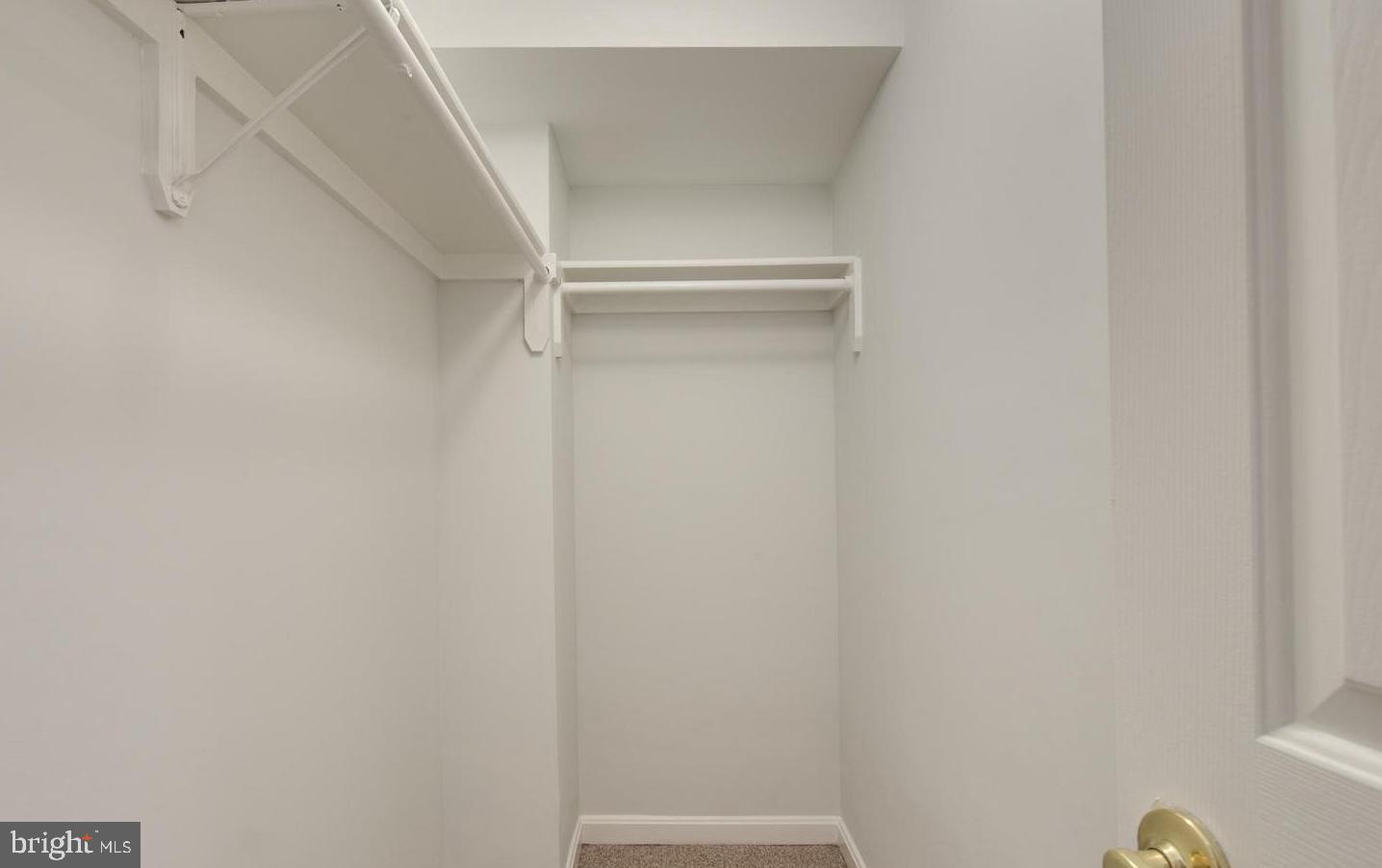 1321 Fairmont Street Northwest, Unit 1 Washington, DC 20009 - Photo 17 of 22 a view of an empty walk in closet