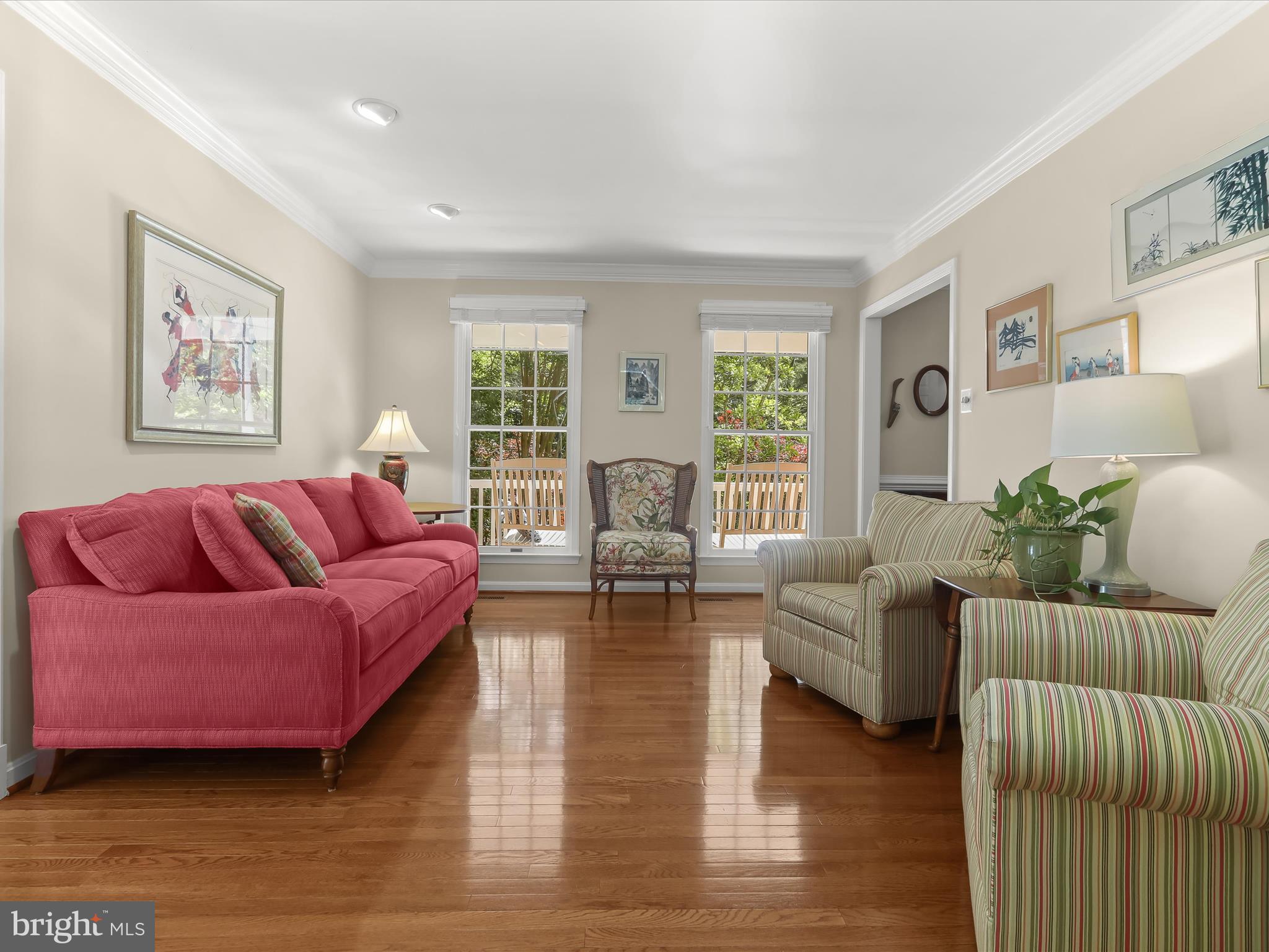 10634 Quarterstaff Road Columbia, MD 21044 - Photo 14 of 62 a living room with furniture and a large window