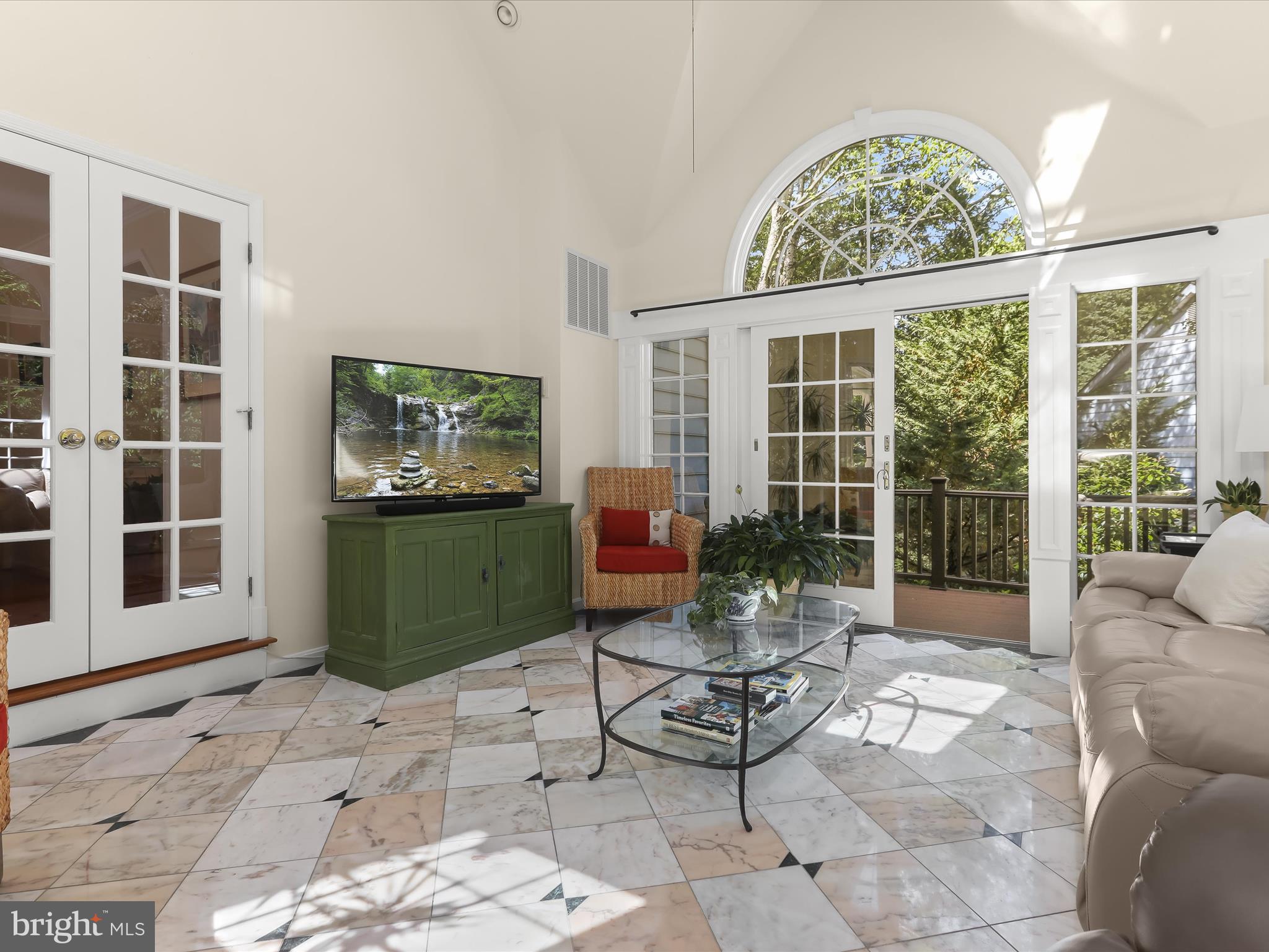 10634 Quarterstaff Road Columbia, MD 21044 - Photo 16 of 62 a living room with furniture and a large window