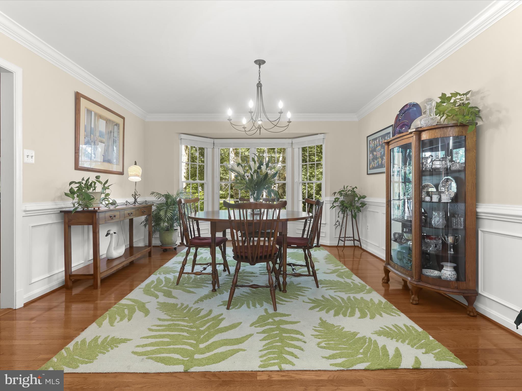 10634 Quarterstaff Road Columbia, MD 21044 - Photo 3 of 62 a view of a dining room with furniture window and wooden floor