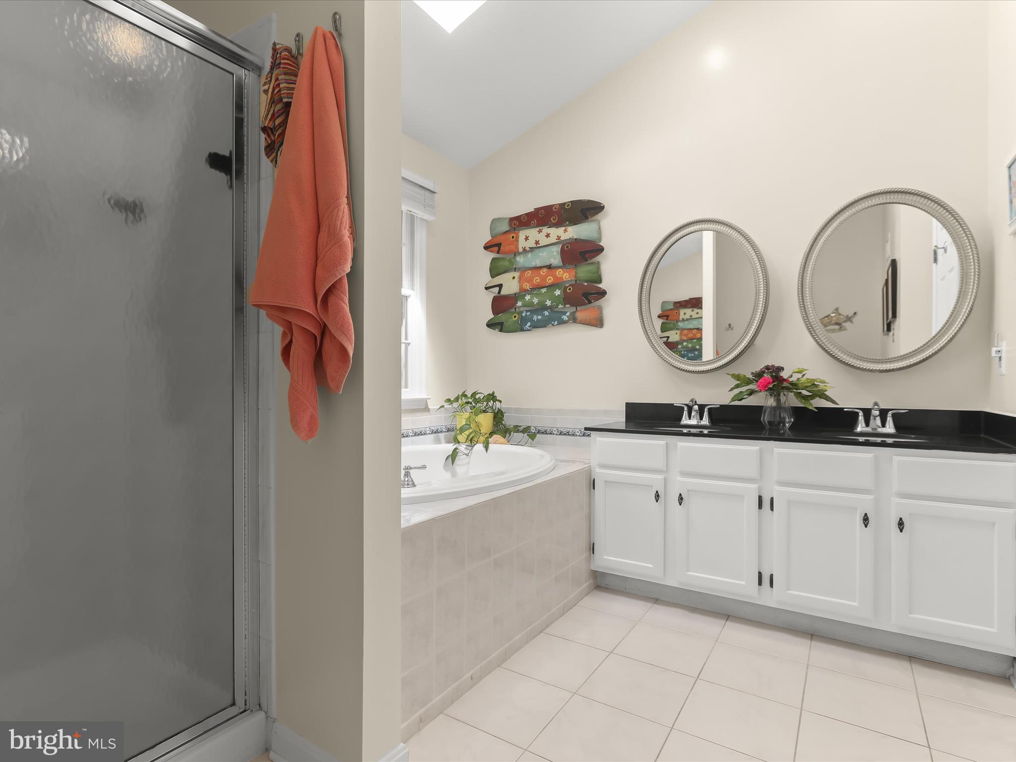 10634 Quarterstaff Road Columbia, MD 21044 - Photo 38 of 62 a kitchen with white cabinets and a sink