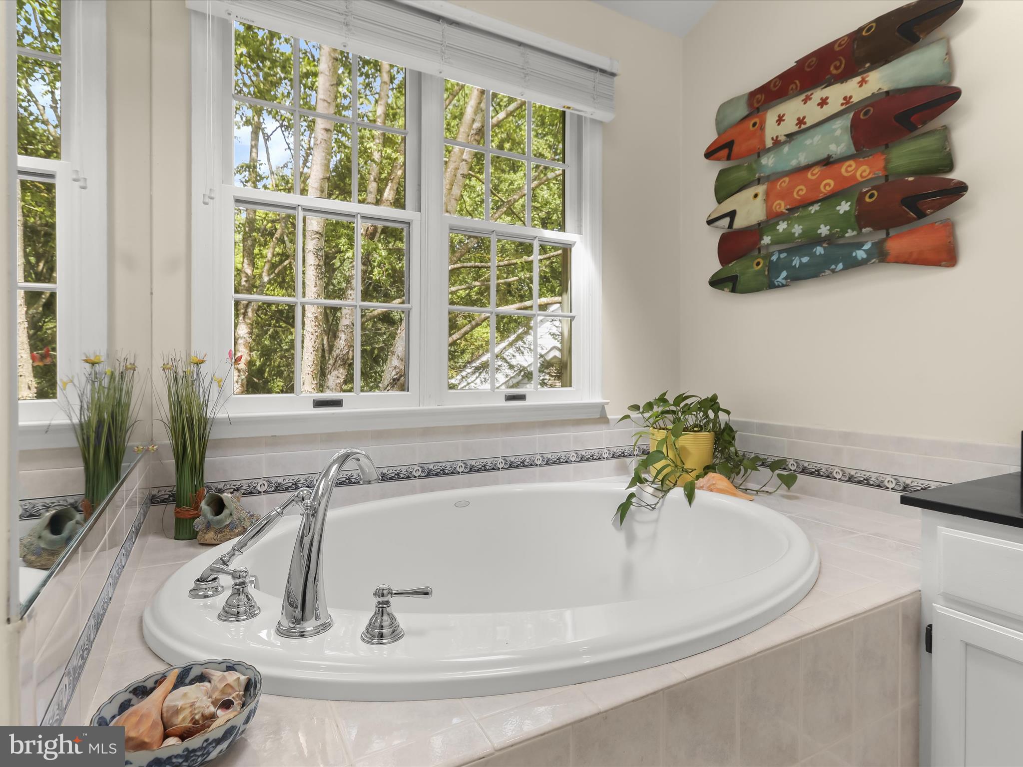 10634 Quarterstaff Road Columbia, MD 21044 - Photo 39 of 62 a bathroom with a sink and a window